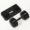 Cito Thriven adjustable dumbbell set with 25lb to 55lb weights, featuring black and silver handles and weight plates for strength training.