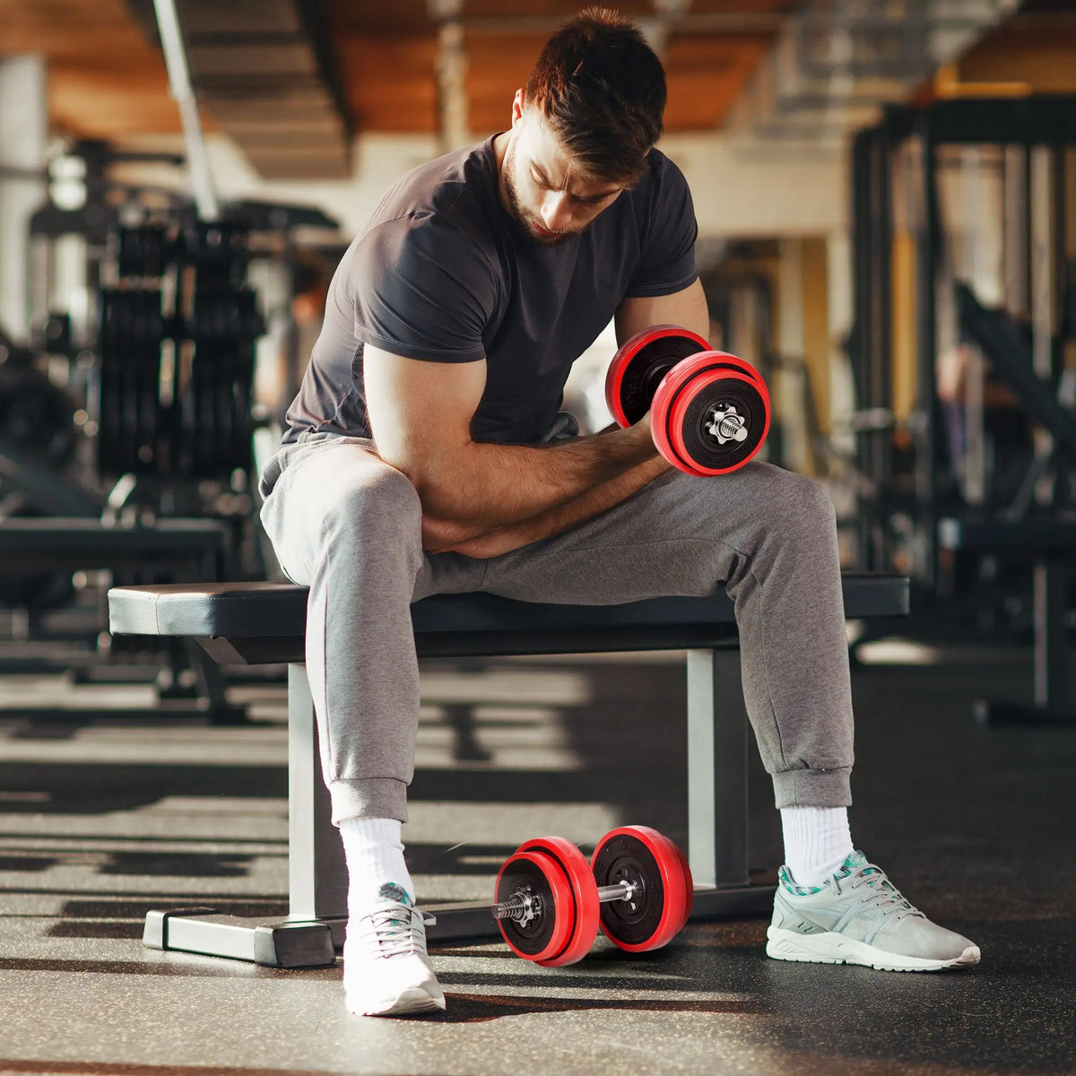 Cito Thriven 44lb convertible dumbbell set with adjustable weights and compact storage, ideal for versatile strength training.